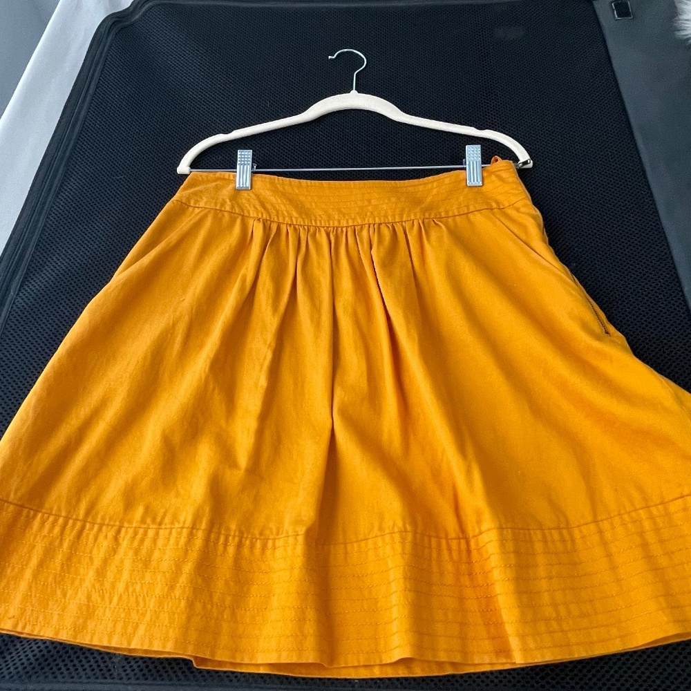 Mustard yellow pleated skirt